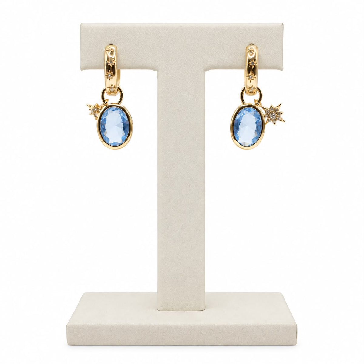 Brinco cristal london blue zirc. branca oval e argola estrelada